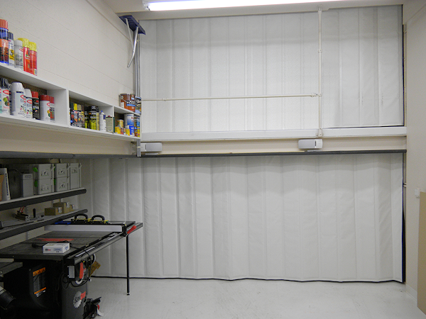 accordian folding insualted curtain accordion-insulated-garage-curtain