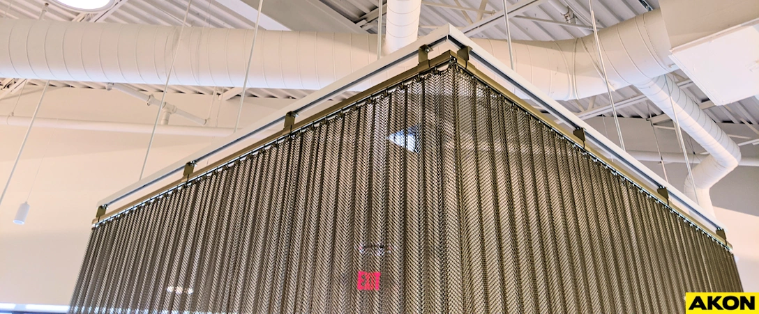 steel mesh enclosure for protecting workers from fyling debris