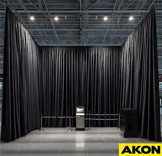 Large fabric curtain enclosures providing secure, flexible barriers in areas by AKON