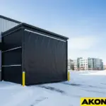 black-insulated-curtain-wall-building-snow