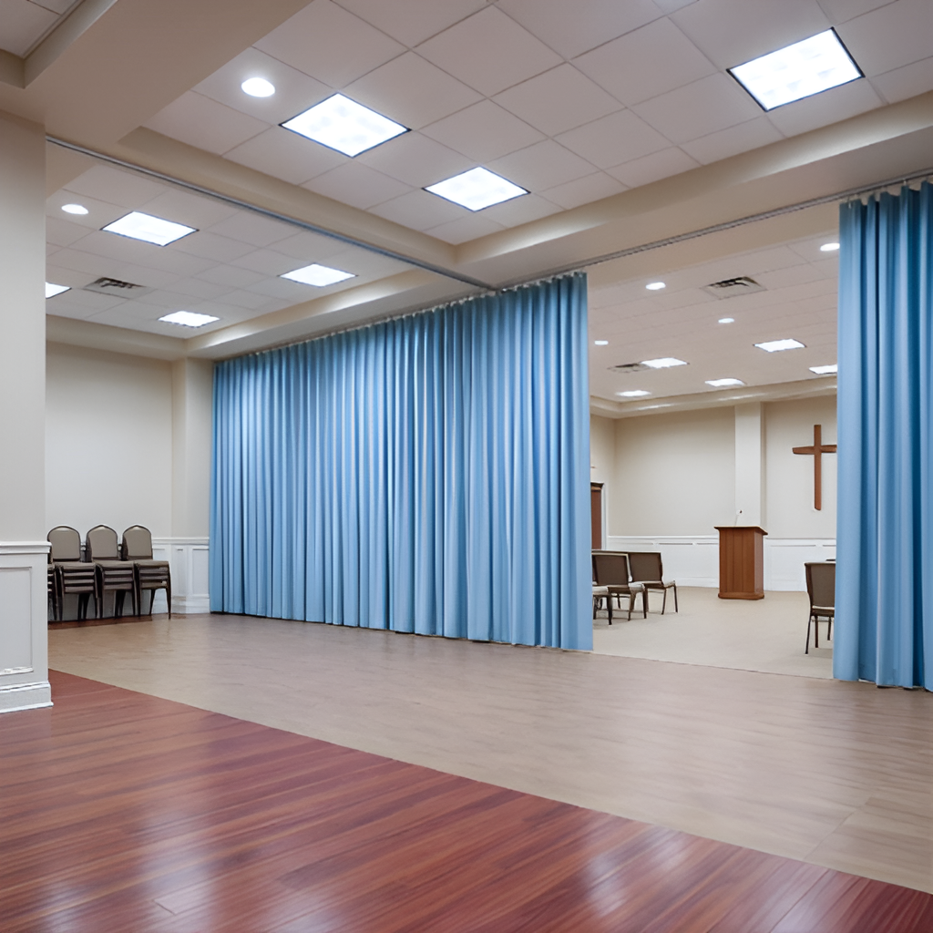 Blue church divider curtain creating flexible space inside a church facility