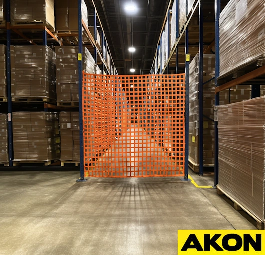 Warehouse safety aisle barrier